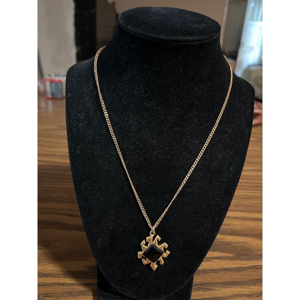Gold tone necklace with black and gold design vintage